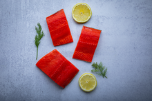 Load image into Gallery viewer, Buying Club SALMON PORTIONS 20 LB CASE  •  $15.99/lb